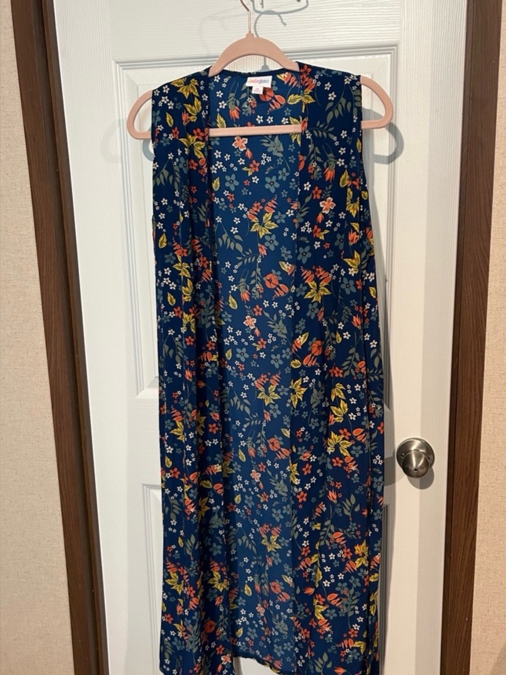 Navy Floral Sleeveless Duster Vest m lularoe